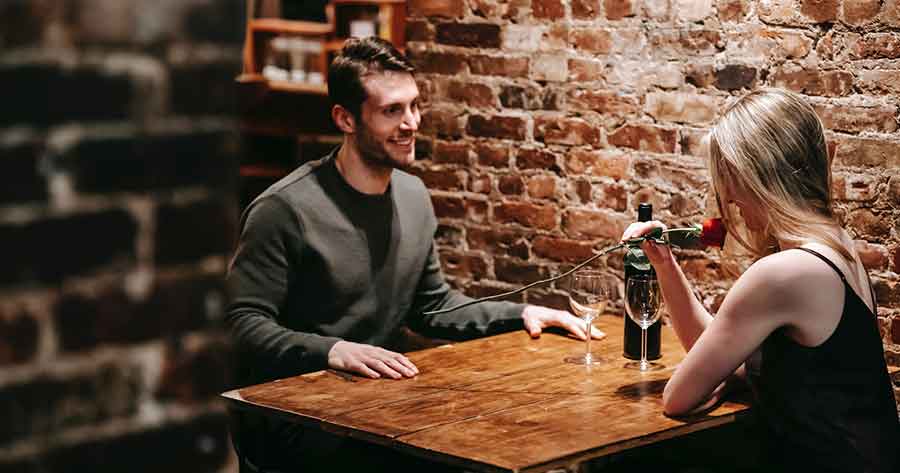 A photo of a man and a woman on a romantic date