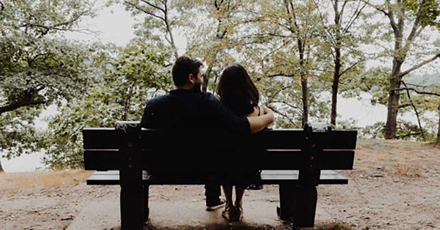 couple sitting on a bench